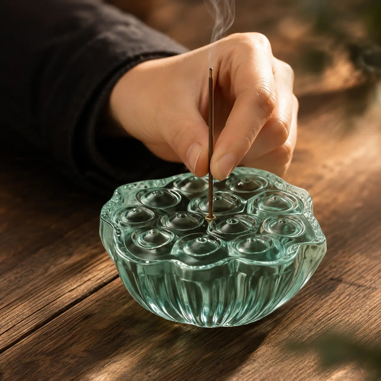 Green lotus glass incense holder used for clean incense burning and aromatherapy