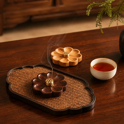 Wooden incense holder with incense sticks for a cozy aromatherapy home ritual