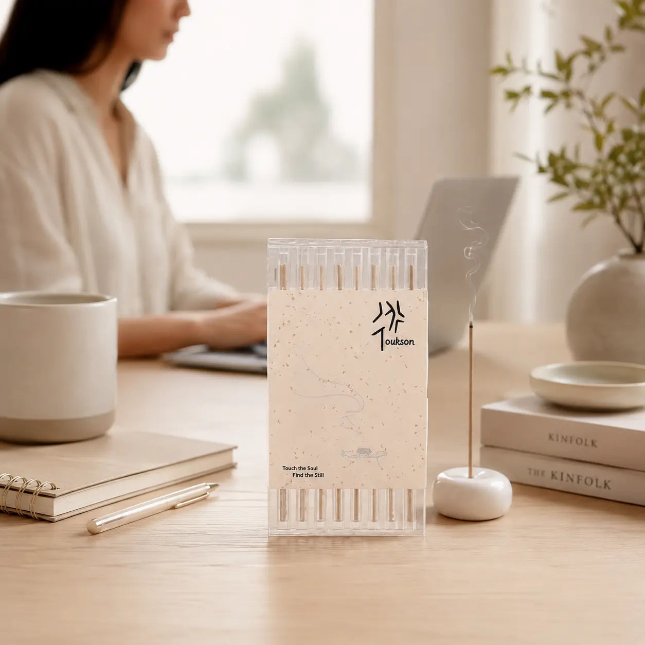 Toukson focus incense on a work desk for study, productivity, and creative flow